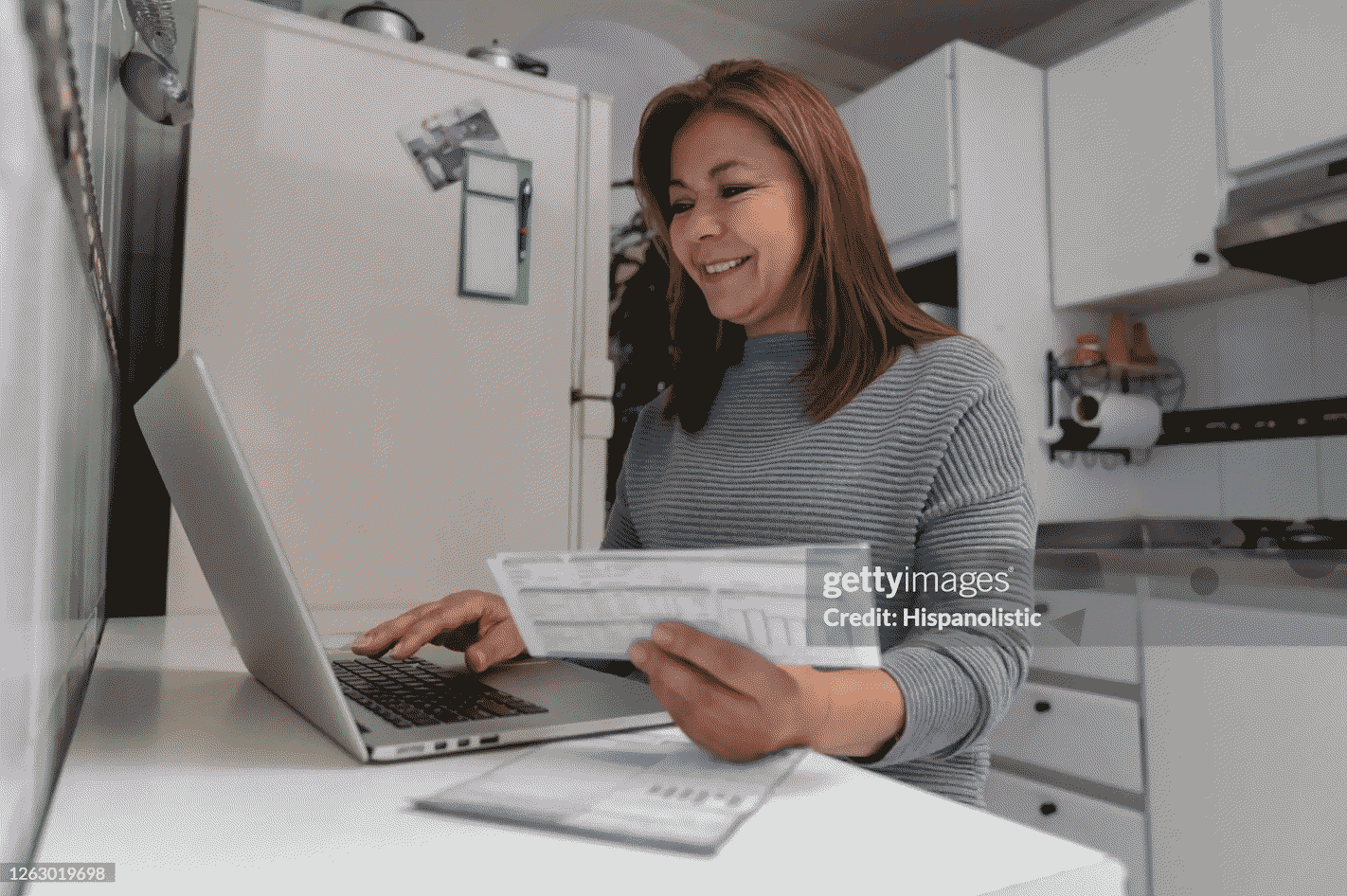Photo of woman working on a budget